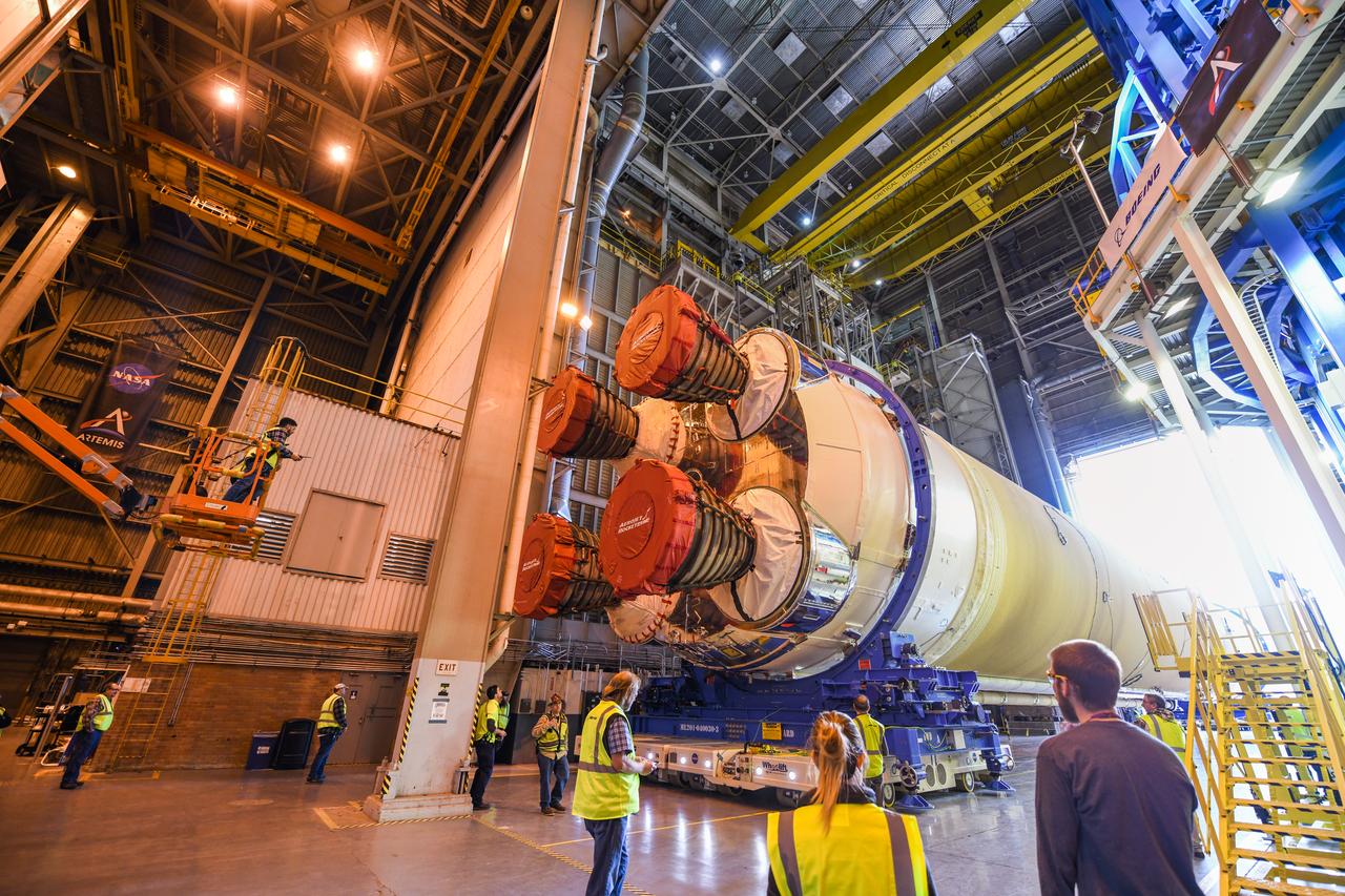 These images show how teams at NASA’s Michoud Assembly Facility in New Orleans moved the core stage, complete with all four RS-25 engines, for NASA’s Space Launch System (SLS) rocket to Building 110 for final shipping preparations on Jan. 1. The SLS core stage includes state-of-the-art avionics, propulsion systems and two colossal propellant tanks that collectively hold 733,000 gallons of liquid oxygen and liquid hydrogen to power its four RS-25 engines. The completed stage, which will provide more than 2 million pounds of thrust to help power the first Artemis mission to the Moon, will be shipped via the agency’s Pegasus barge from Michoud to NASA’s Stennis Space Center near Bay St. Louis, Mississippi, later this month. Once at Stennis, the Artemis rocket stage will be loaded into the B-2 Test Stand for the core stage Green Run test series. The comprehensive test campaign will progressively bring the entire core stage, including its avionics and engines, to life for the first time to verify the stage is fit for flight ahead of the launch of Artemis I.